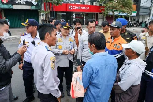 Surabaya Terapkan Parkir Non Tunai, Jukir yang Tolak Aktivasi Rekening Bakal Diganti 1 sekarangaja